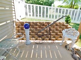 Antique cultivator. Gazing ball. 