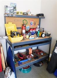 Nice clean work bench. Tiny chain saw. 