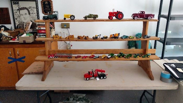 John Deere, construction vehicles, cars, trucks - used as railroad accessories