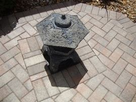 Pagoda covers drain in patio