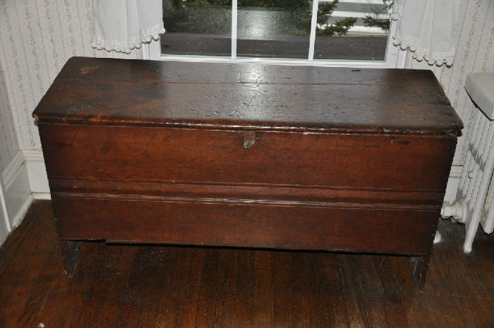 Early 1800's 6-Board pine blanket box w/snipe hinges, boot jack legs & rose head nails construction in original finish.