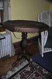ornate carved octagon top walnut stand