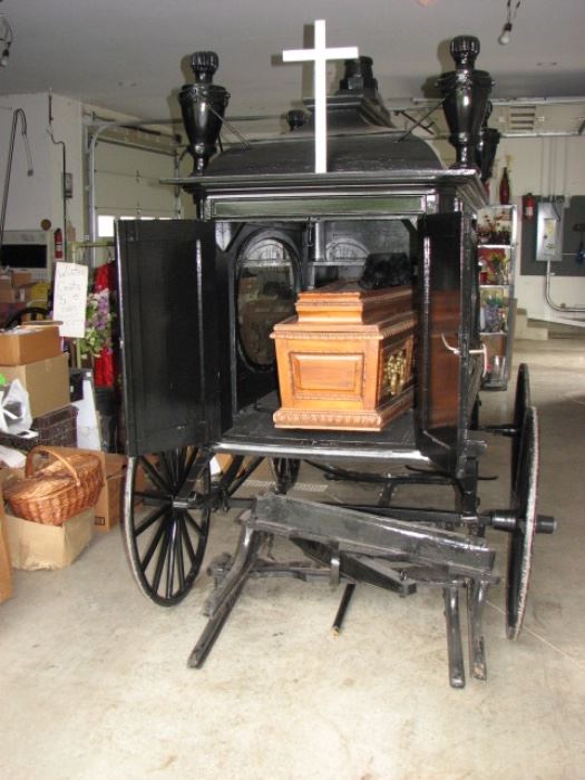 Antique hearse - a horse drawn sleigh / carriage.  Includes casket.