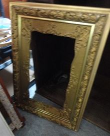 One of several antique picture frames.