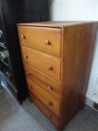 One of several small chests of drawers.