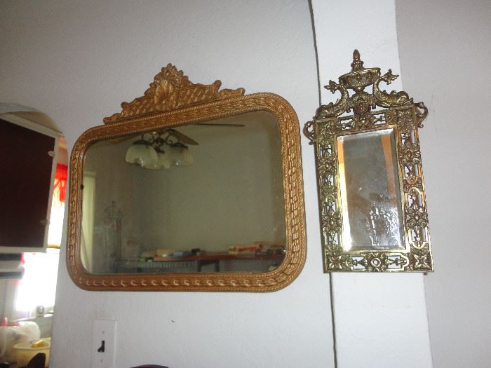 Two antique mirrors - small one is solid brass.
