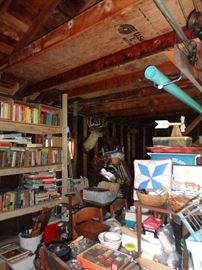 The garage is overloaded with many interesting antique, vintage and just plain "old" items.... tools, books, toys and more.