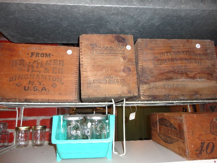 Part of collection of wood advertising crates and boxes.