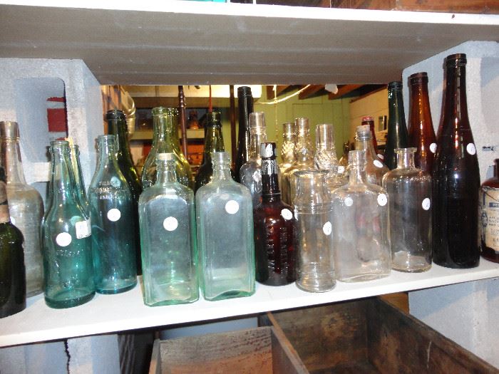 Large and varied collection of bottles.