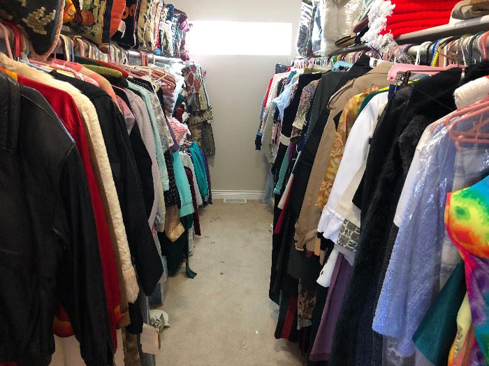 Closets full of clothing ... many are brand new with tags still attached.
