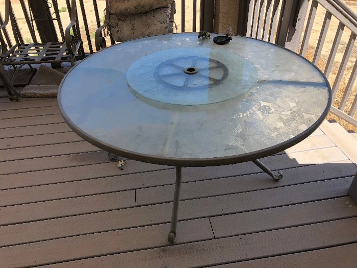 patio table with lazy susan and 4 matching chairs