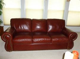 Like new leather sofa w/tack trim