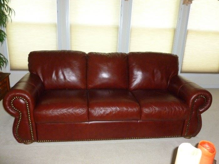 Like new leather sofa w/tack trim