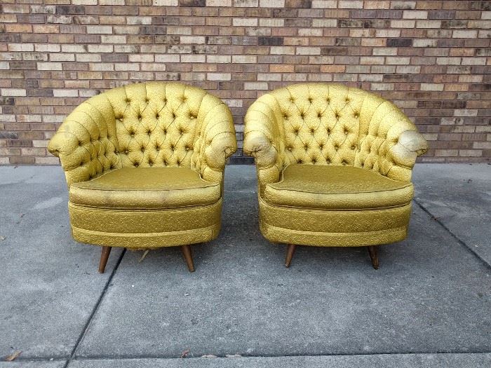 Pair of Hollywood regency gold satin tufted barrel back swivel chairs - $500

