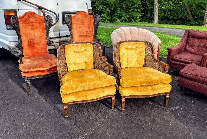 Pair of hollywood regency orange velvet ebony frame wing chairs, original-found condition - $200,  Pair of gold velvet cane club chairs - $100/pair 
