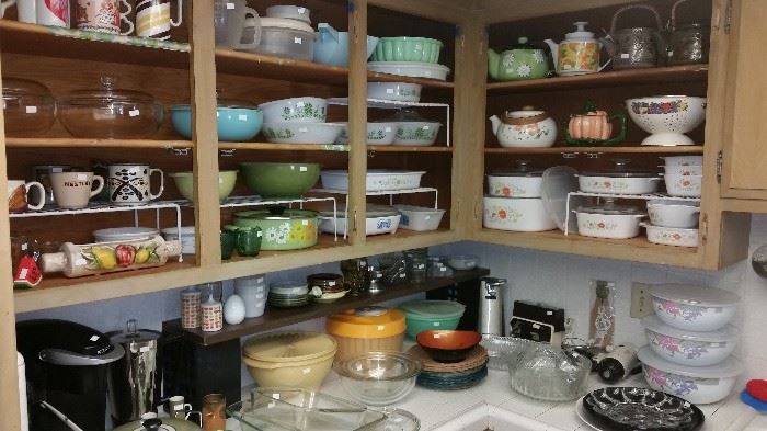 Kitchen is packed with Pyrex, Corning ware and much more.