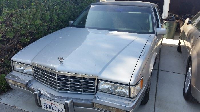 1992 Cadillac DeVille with 67K miles.