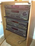 Complete "Technics" stereo system, including stand-up speakers, 3 small speakers, and matching cabinet