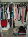 Several closets filled with vintage and new clothes