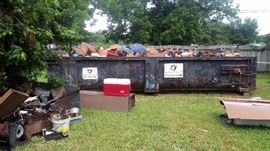 ONE OF THE DUMPSTERS OF PURE TRASH THAT WE HAD TO SEPARATE AND PULL OUT SO WE COULD HAVE THE SALE