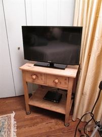32" Flat Screen TV on Oak Table.  Table is 30"H x 21 1/2"D x 27 1/2"W.  