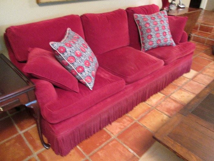Red sofa with Fringe.
