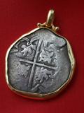 1635 Spanish Colonial 8 reale silver cob coin in 18K gold bezel. Minted in Potosi, Bolivia and recovered from the wreck of the Nuestra Senora de la Concepcion. Comes with a letter of authenticity. Super nice piece of jewelry!