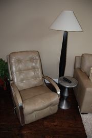 Lazy boy leather recliner/rocker, Matte Geo accent table in lacquered aluminum from Ethan Allen and custom wood floor lamp from Charles Lamps.