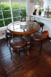 six bar stools and cafe table