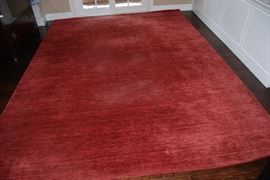 LOOMED RED WOOL RUG BOUGHT FROM ETHAN ALLEN.  SIZE 8' 6" X 11'6"