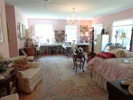 10'x15' wool rug sets off the treasures in the master bedroom. 