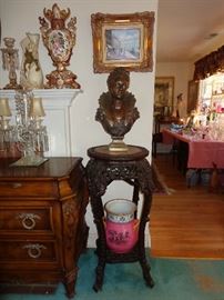 Antique carved plant stand.