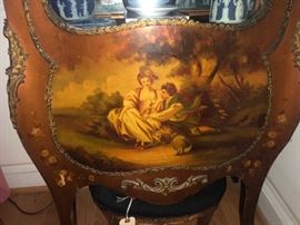 Close up of the painted panel on the vitrine. 