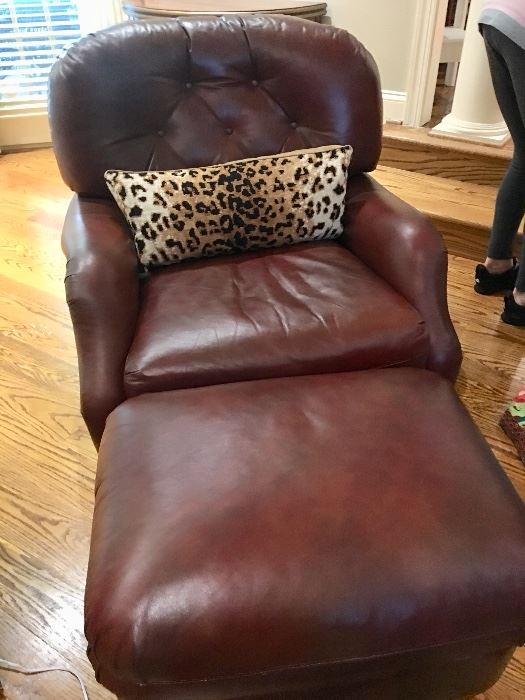 One of two leather chairs and ottomans (mint condition)