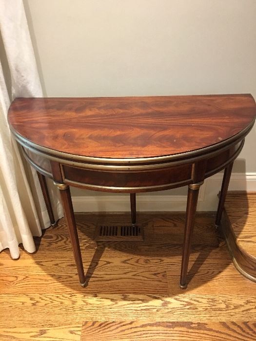One of a pair of demilune tables