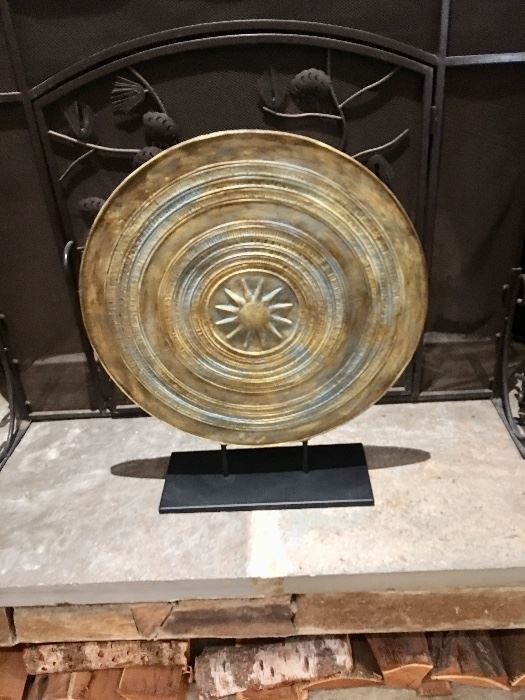 Large pottery plate on stand