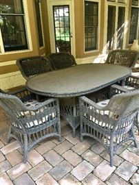 Outdoor wicker dining table and chairs