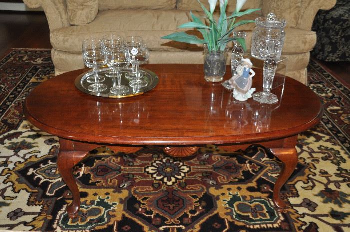 Cherry oval coffee table  45" w x 17"h x 27.5" d