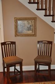 A pair of counter height cherry with beige upholstered seat