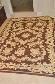 Lovely brown and beige floral embroidery area rug