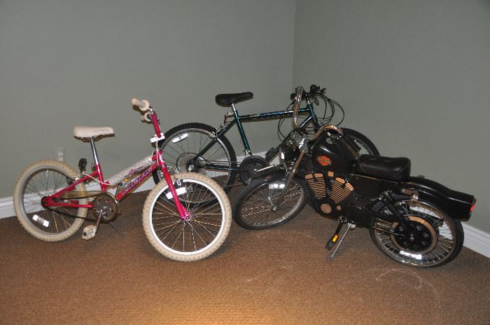 Children' pink Pacific bike, boys 15 speed Huffy, and Ha arley Davidson  Blackhawk Roadmaster boys bike 