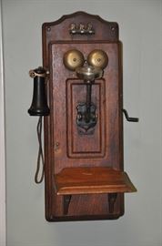 Antique wooden crank telephone by American Electric Telephone Co. 