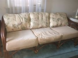 Vintage Classic Rattan, Inc. couch, recliner, dining table and 4 chairs and end table.
