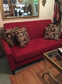 Contemporary red micro suede couch.