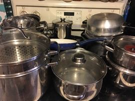 Full kitchen—pots and pans.