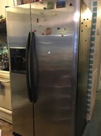 Newer Kenmore side-by-side refrigerator, stainless steel.