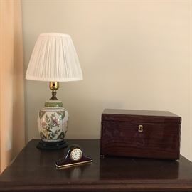 Green flowered vase lamp and decorative box with clock
