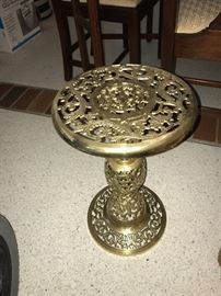 Ornate brass filigree end table