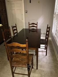 Kitchen table and 8 side chairs with cane seat