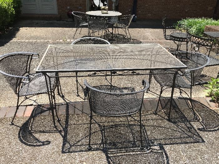 Vintage wrought iron patio table and 4 chairs